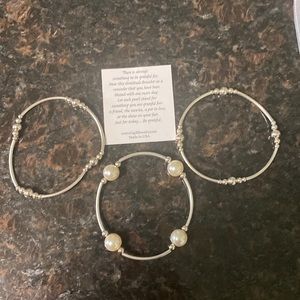 Set of three Grateful bracelets.